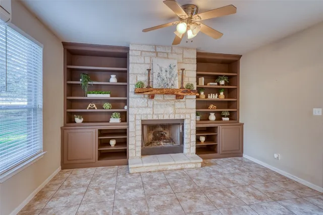 a kitchen with a dining table chairs stainless steel appliances and cabinets