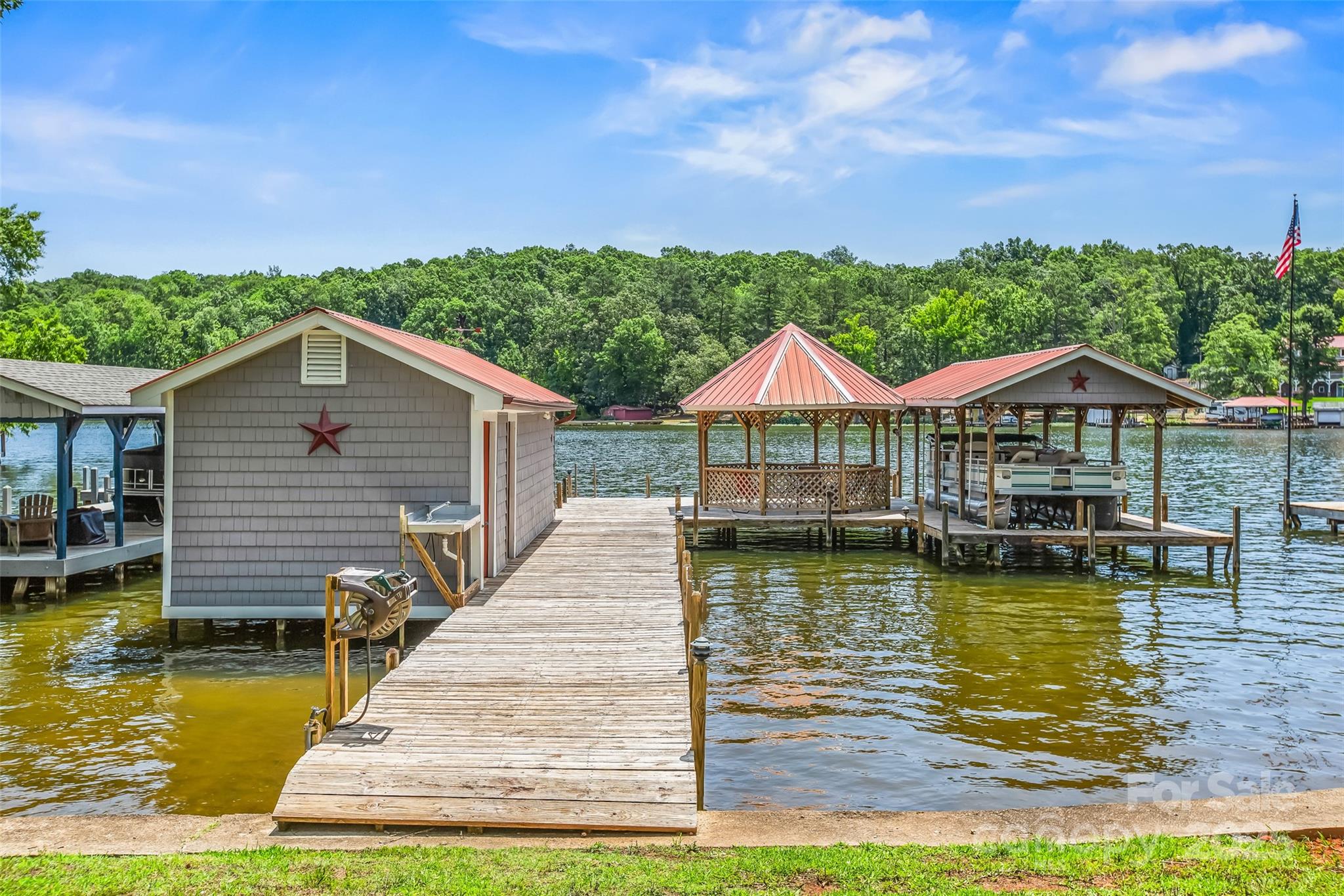 188 Nicks Road, Unit 20/21 Norwood, NC 28128 - Photo 15 of 20 a view of house with swimming pool yard and outdoor seating