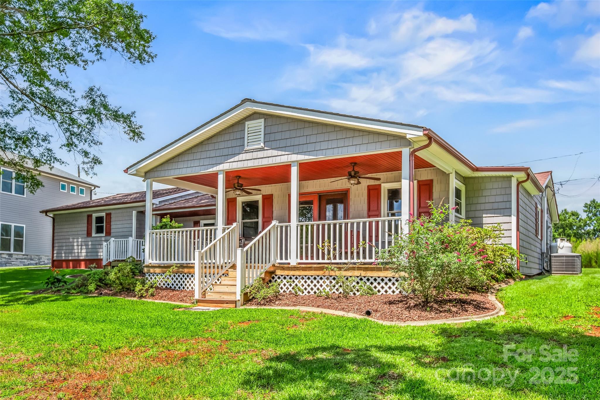 188 Nicks Road, Unit 20/21 Norwood, NC 28128 - Photo 18 of 20 a front view of a house with a yard