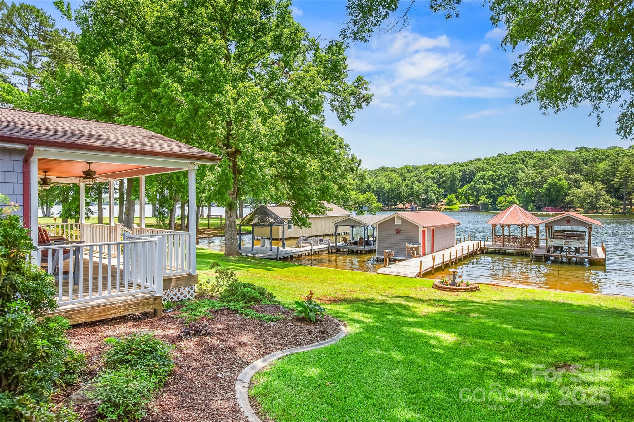 188 Nicks Road, Unit 20/21 Norwood, NC 28128 - Photo 2 of 20 a view of a house with swimming pool and porch with furniture