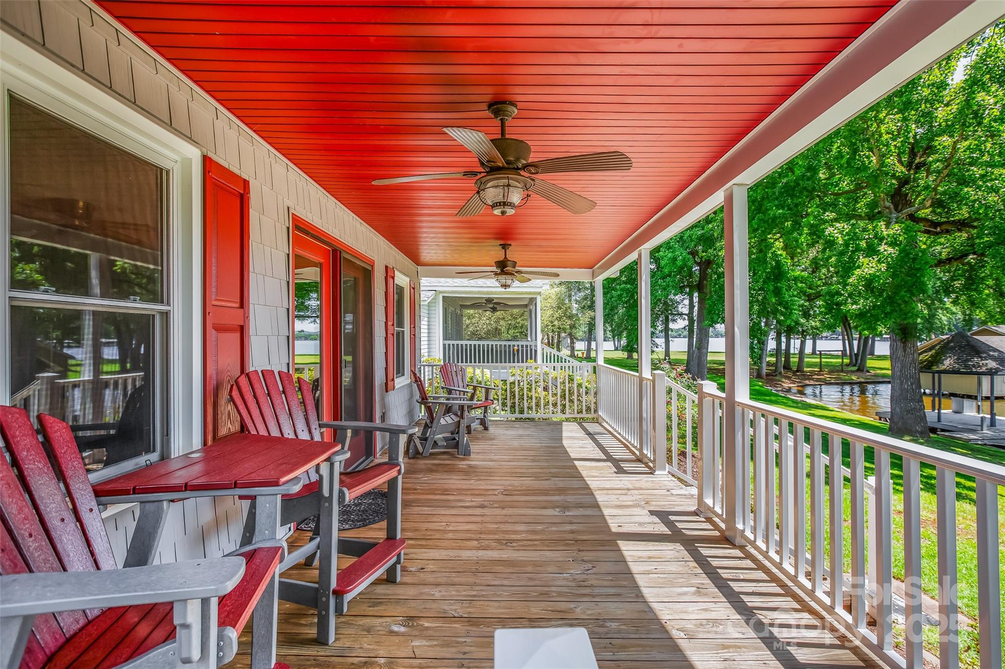 188 Nicks Road, Unit 20/21 Norwood, NC 28128 - Photo 3 of 20 a view of a patio with a table chairs and backyard