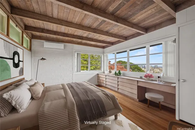 a bed room with a bed and a window