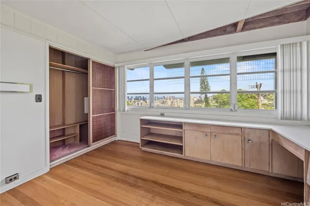a kitchen with granite countertop a stove and a refrigerator