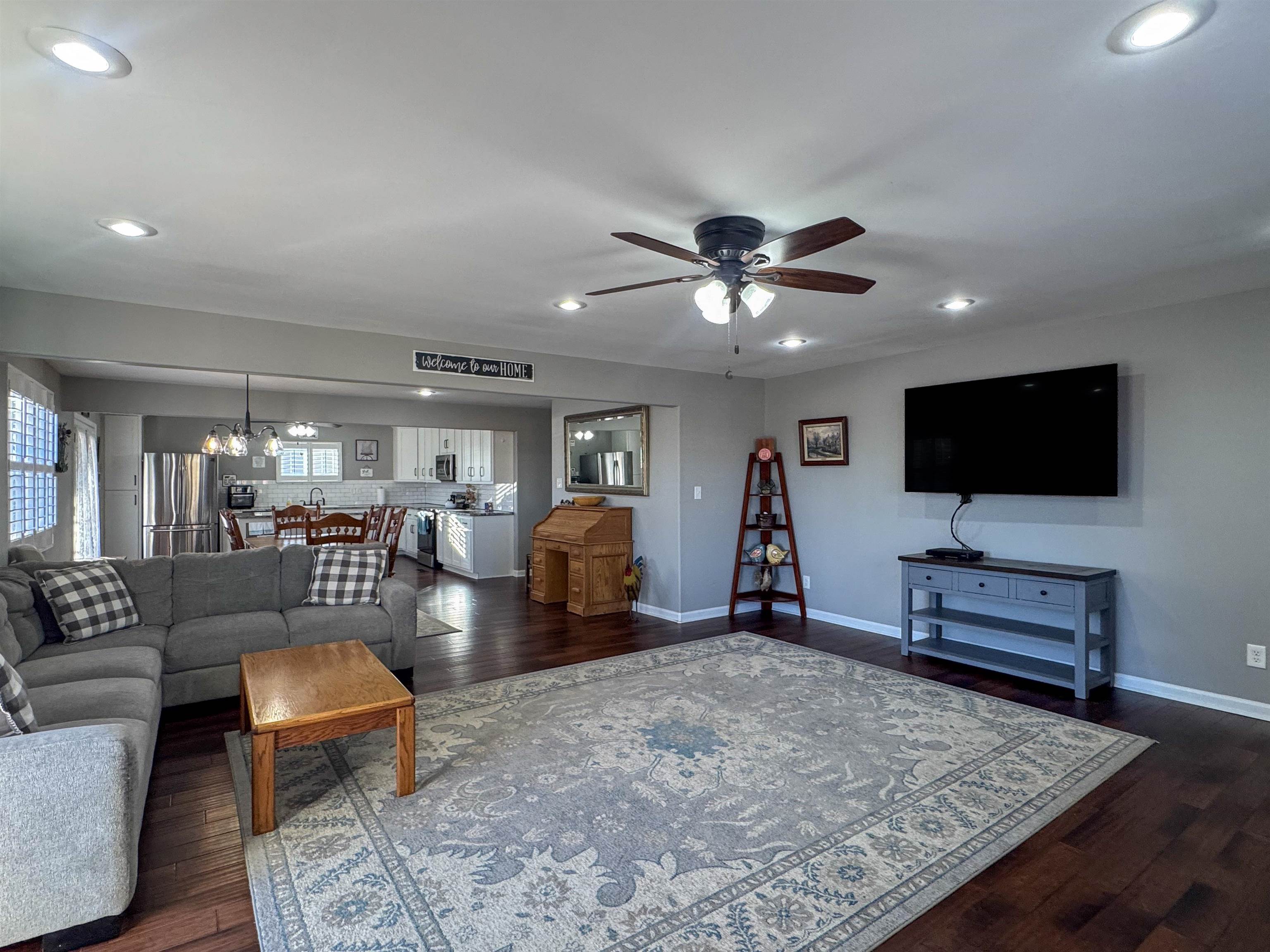 792 Smith Drive Covington, TN 38019 - Photo 11 of 34 Living room with ceiling fan, recessed lighting, and dark wood-style floors