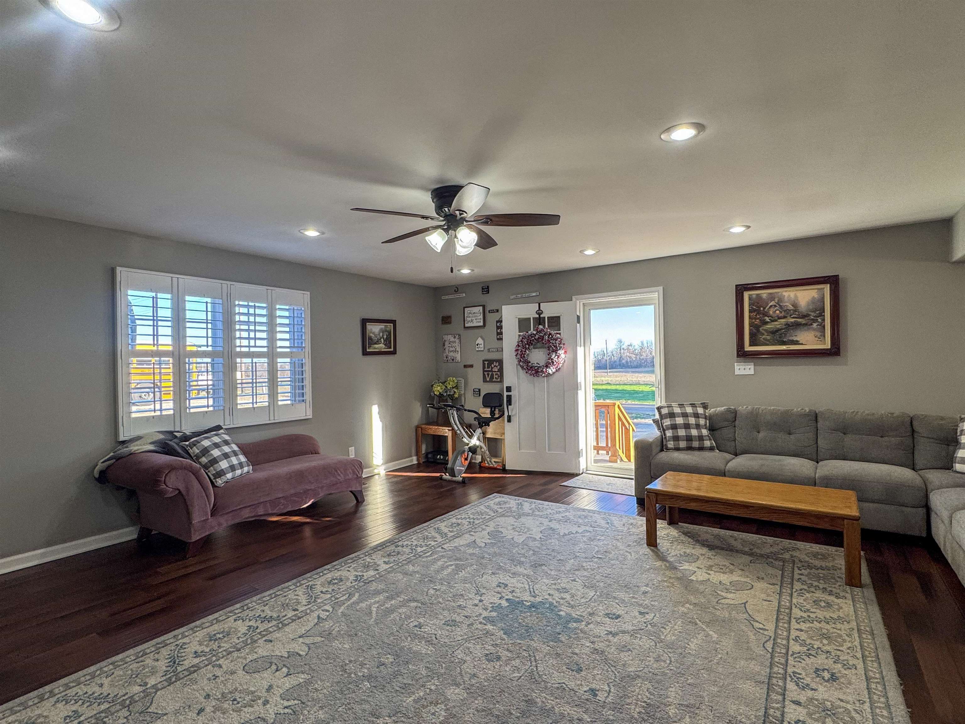792 Smith Drive Covington, TN 38019 - Photo 12 of 34 Living area featuring dark wood-style floors, ceiling fan, plenty of natural light, and recessed lighting