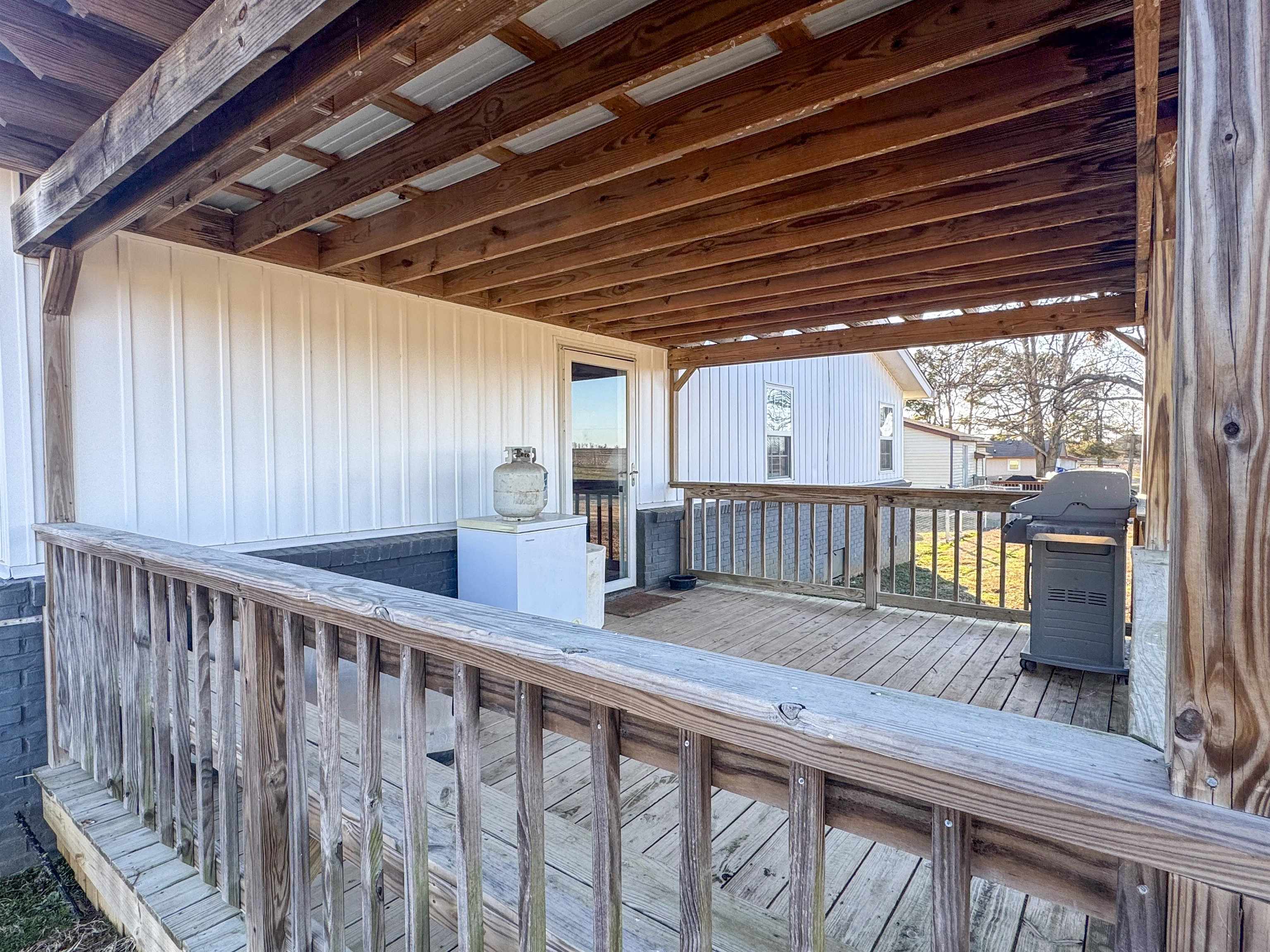 792 Smith Drive Covington, TN 38019 - Photo 9 of 34 a view of balcony with wooden floor