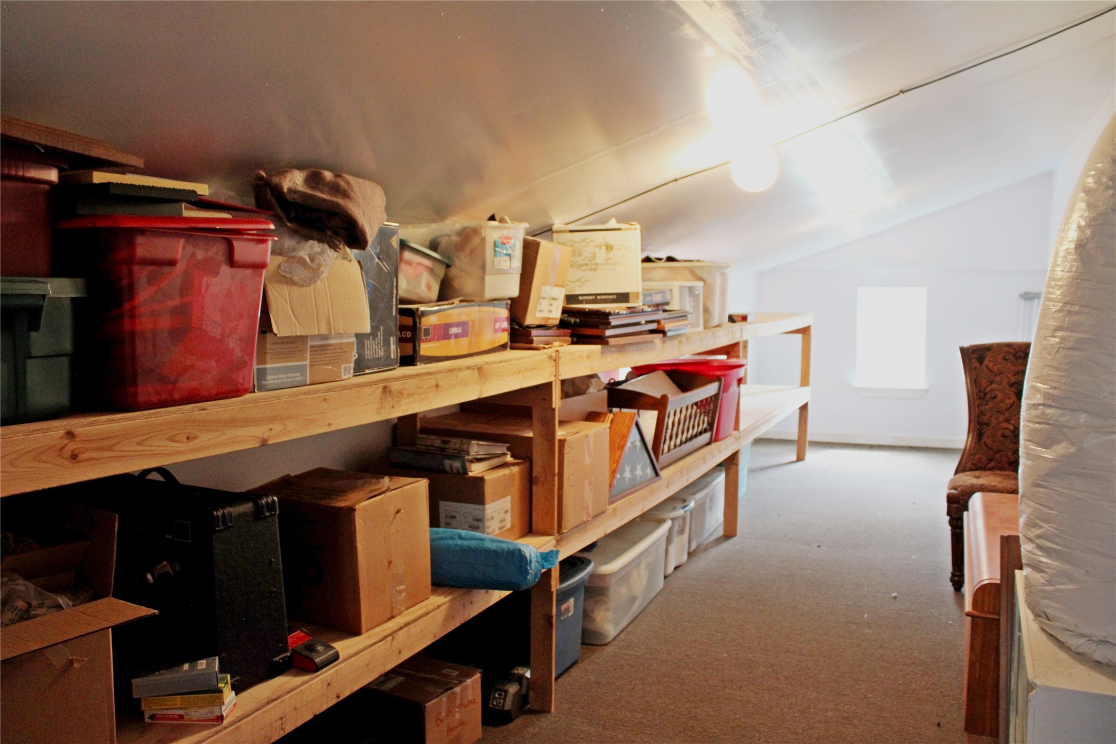 2042 Willow Springs Road Fayetteville, TX 78940 - Photo 26 of 42 a utility room with stainless steel appliances lots of wooden furniture