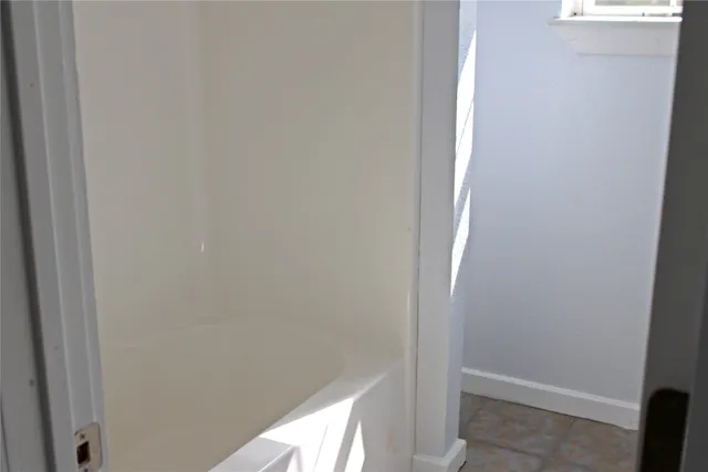 a view of a small space with window