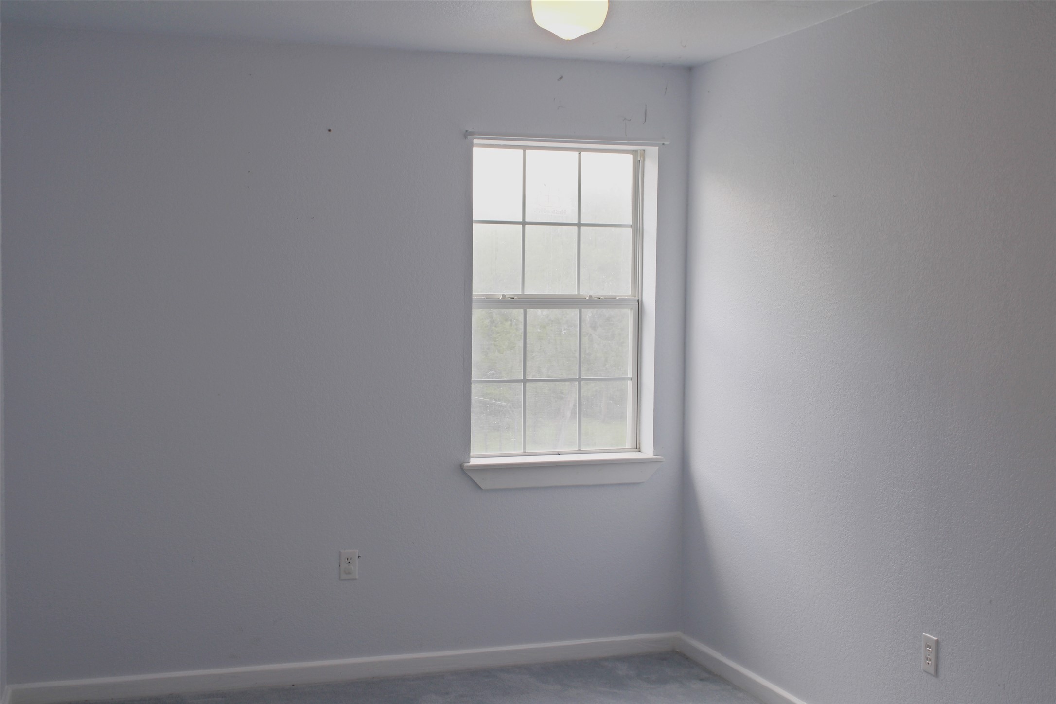 2042 Willow Springs Road Fayetteville, TX 78940 - Photo 32 of 42 an empty room with a window