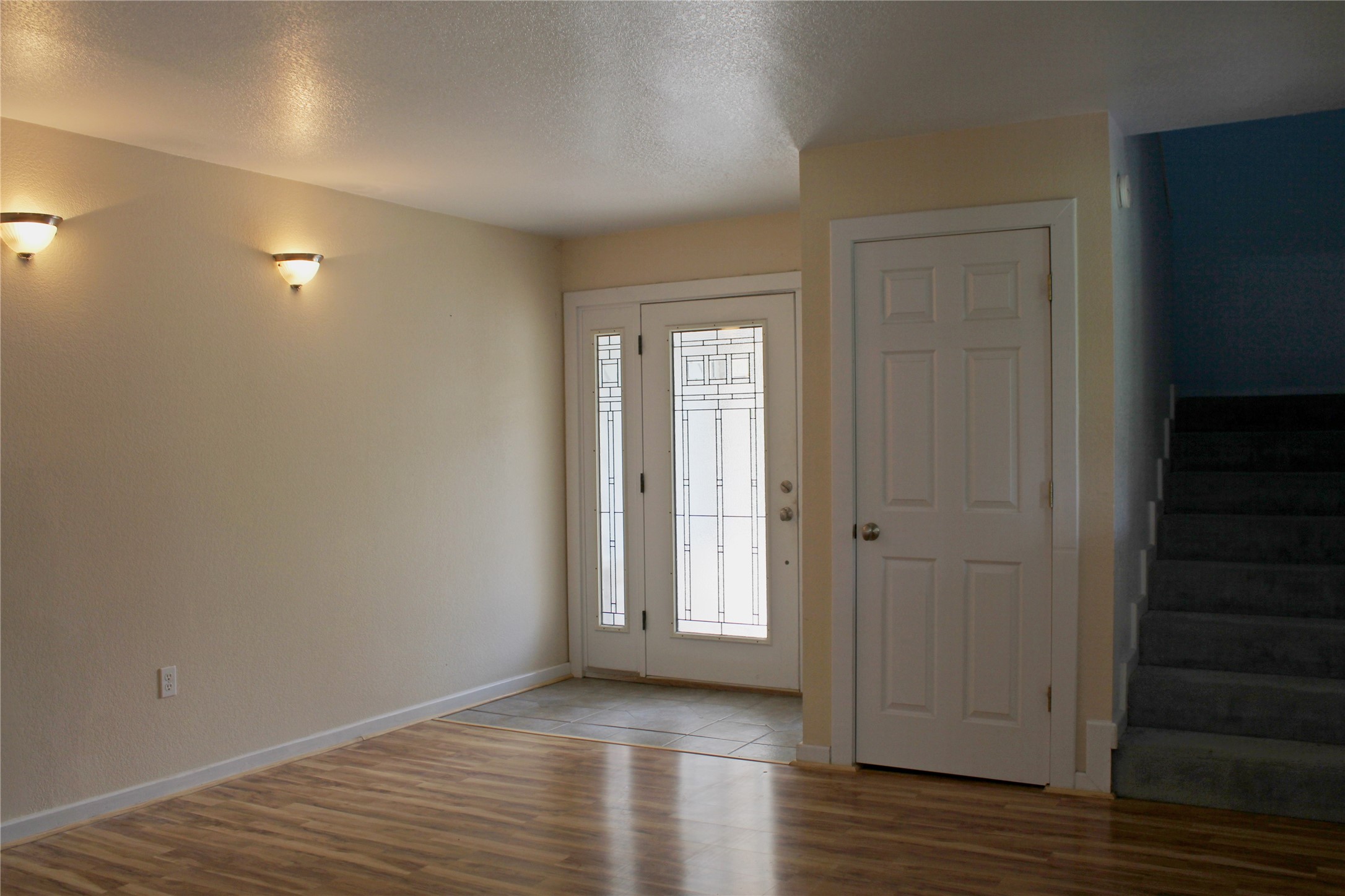 2042 Willow Springs Road Fayetteville, TX 78940 - Photo 4 of 42 a view of an empty room with wooden floor and a window