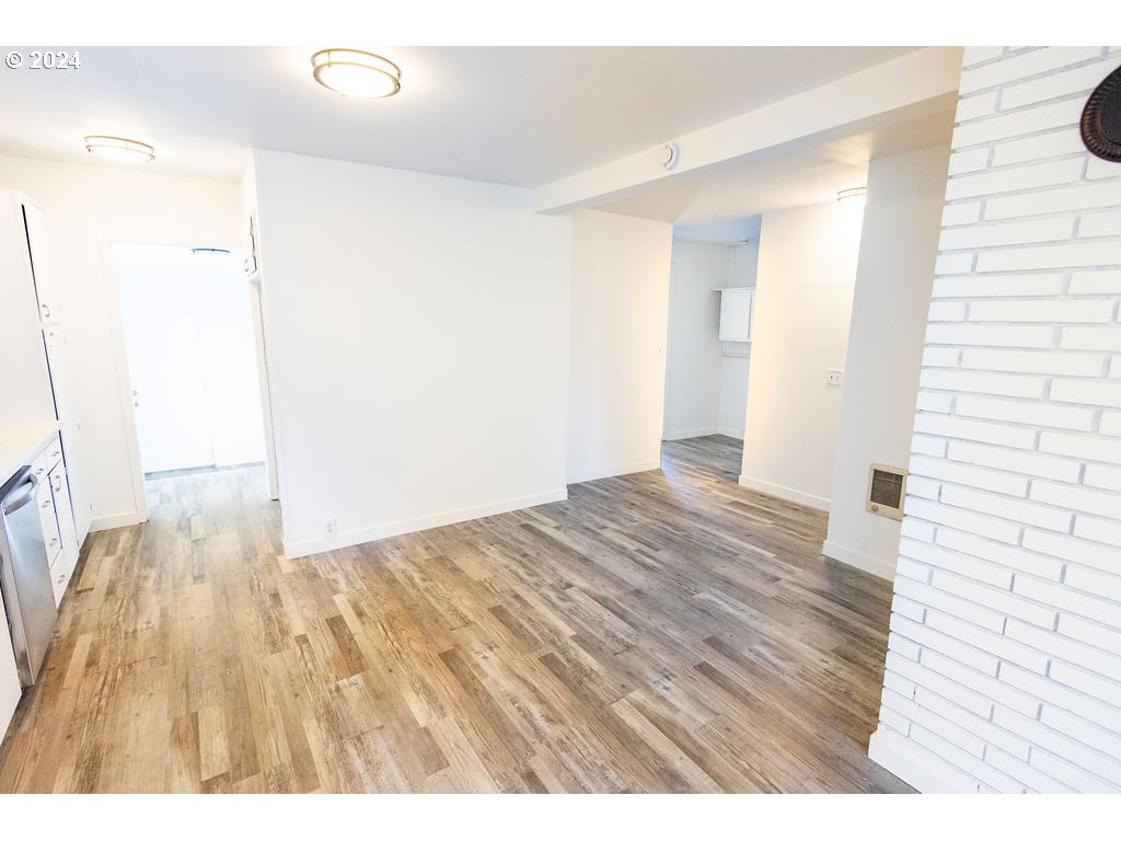 440 Wilkie Street Eugene, OR 97402 - Photo 13 of 38 a view of empty room with wooden floor
