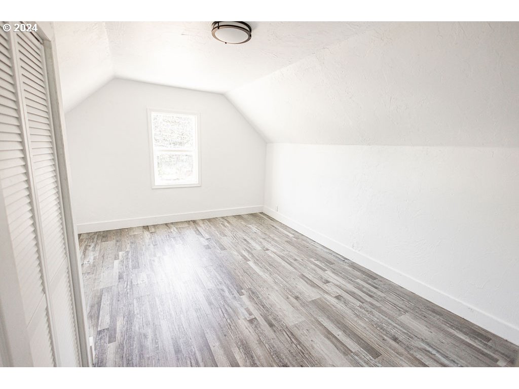 440 Wilkie Street Eugene, OR 97402 - Photo 27 of 38 a view of an empty room with wooden floor