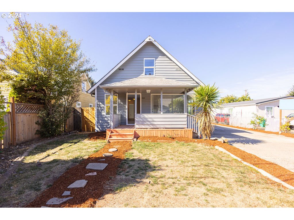 440 Wilkie Street Eugene, OR 97402 - Photo 4 of 38 a view of house with yard and swimming pool