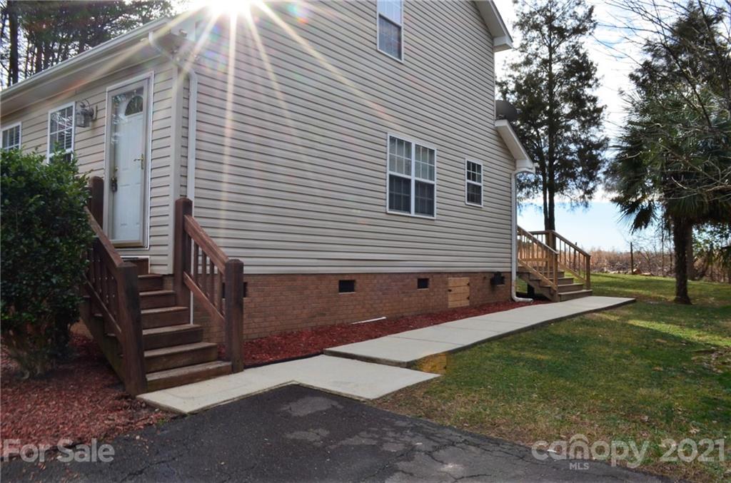 7610 Sarah Drive Denver, NC 28037 - Photo 2 of 48 a view of a house with a yard