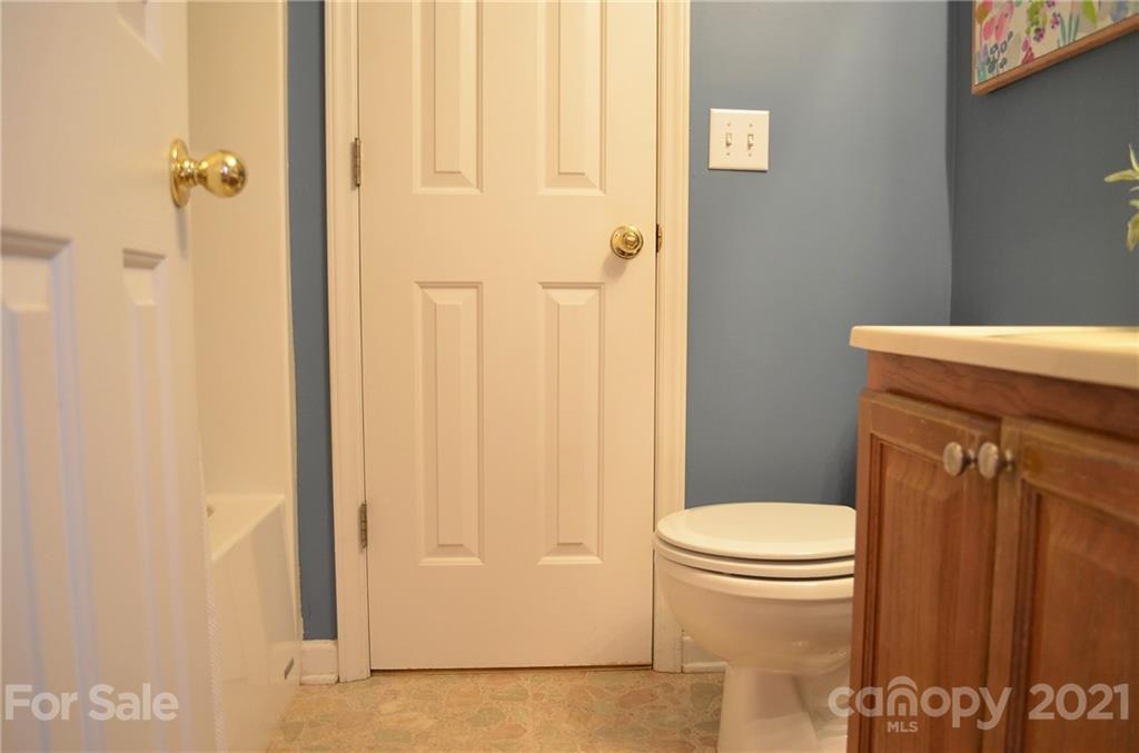 7610 Sarah Drive Denver, NC 28037 - Photo 34 of 48 a bathroom with a sink a toilet and shower
