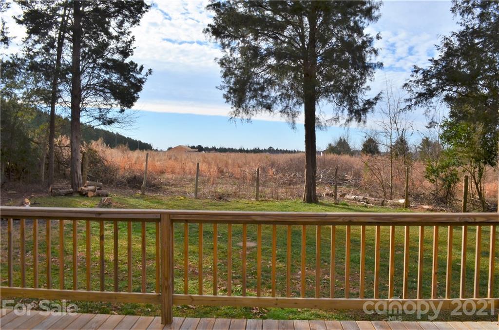 7610 Sarah Drive Denver, NC 28037 - Photo 42 of 48 a view of a lake next to a yard