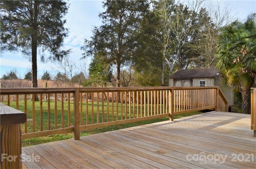 7610 Sarah Drive Denver, NC 28037 - Photo 43 of 48 a view of balcony with wooden floor and fence