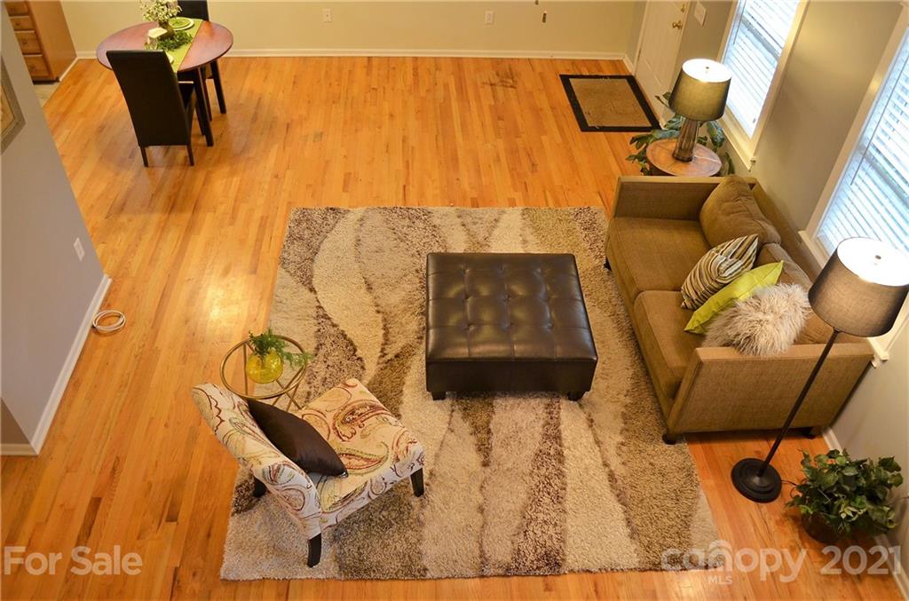 7610 Sarah Drive Denver, NC 28037 - Photo 10 of 48 a bedroom with a bed and teddy bear on bed