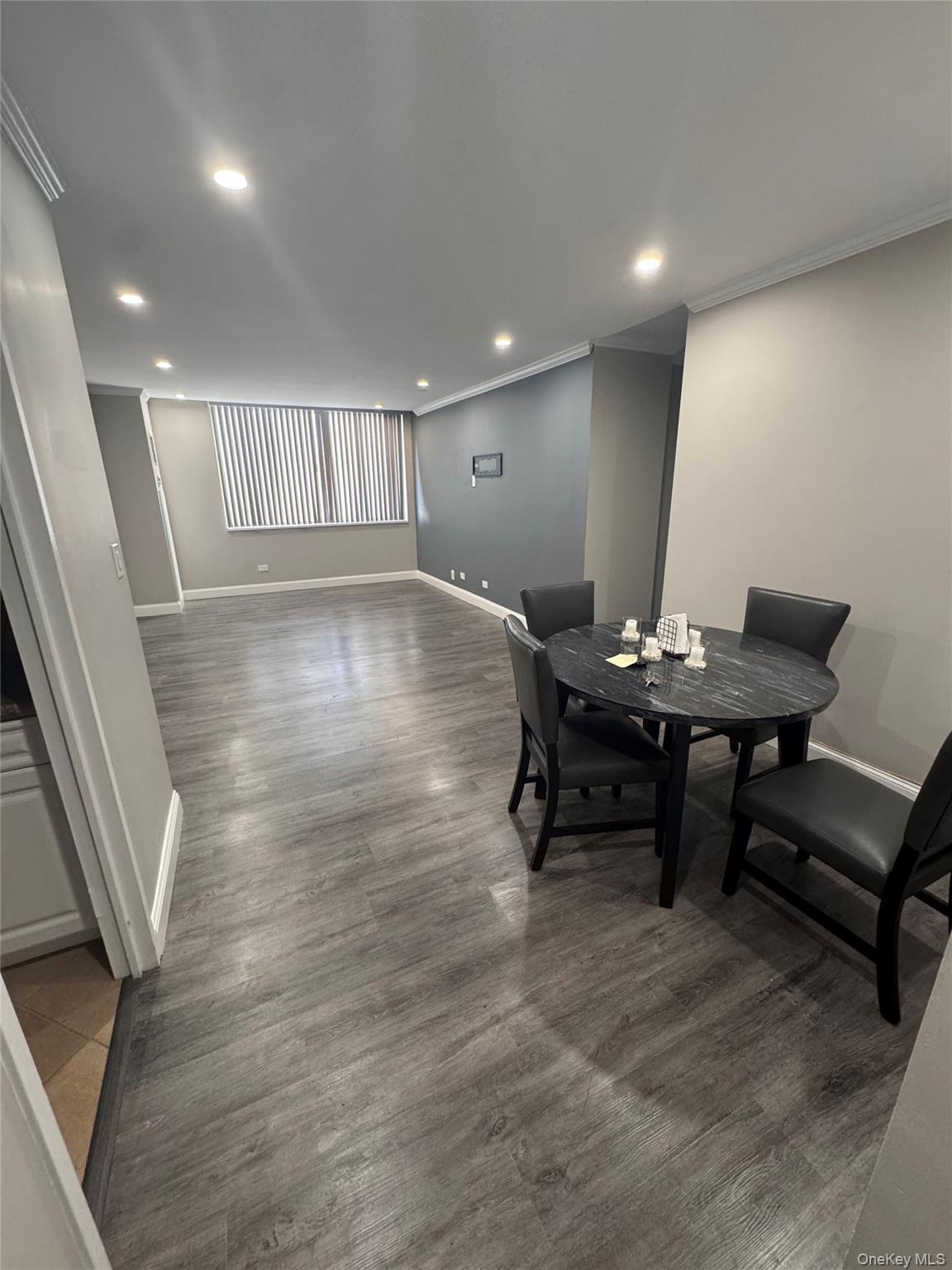 269 Grand Central Parkway, Unit 2C Queens, NY 11005 - Photo 16 of 18 Dining space with recessed lighting, light wood-style floors, and crown molding