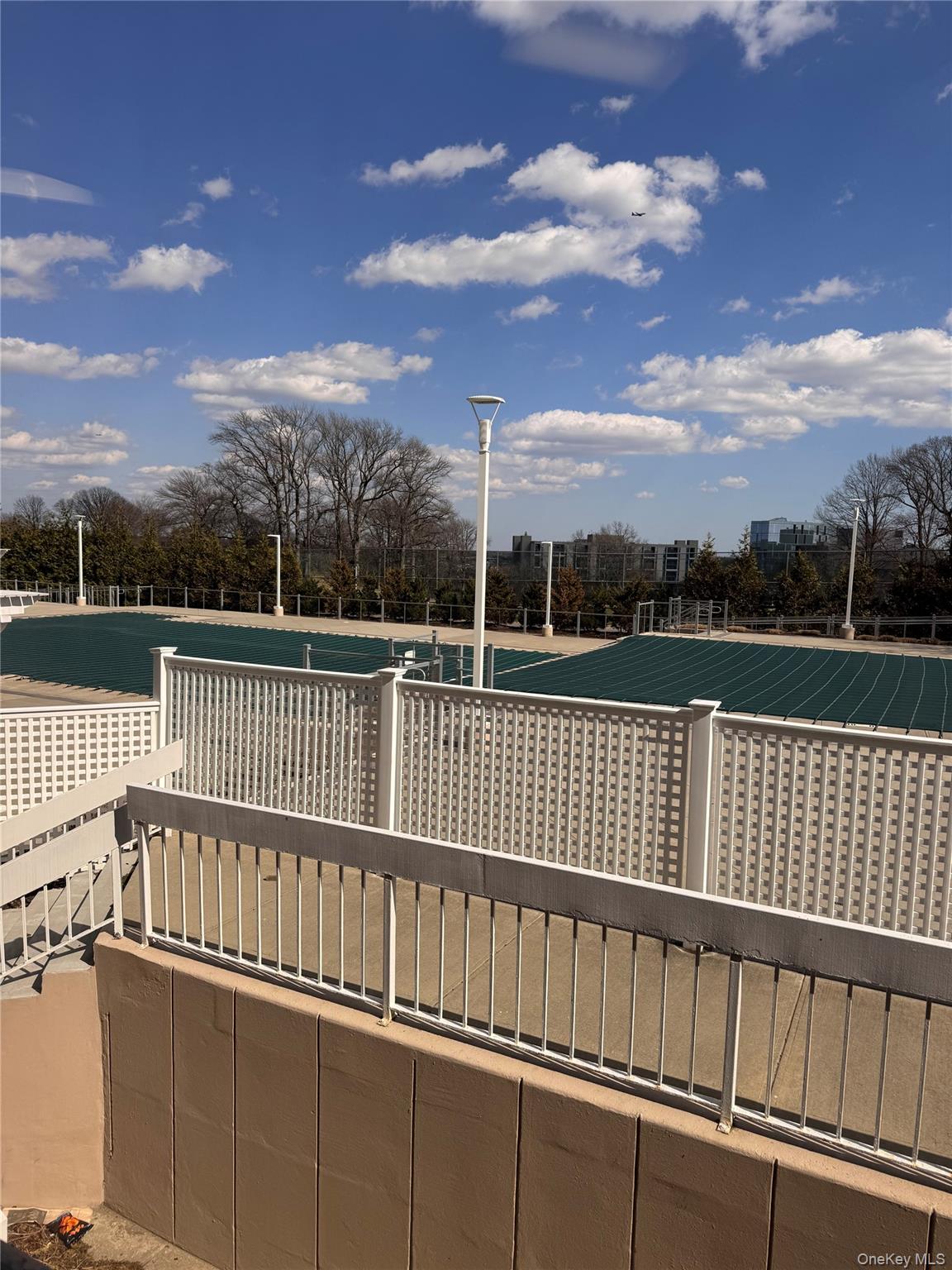 269 Grand Central Parkway, Unit 2C Queens, NY 11005 - Photo 18 of 18 View of swimming pool with fence
