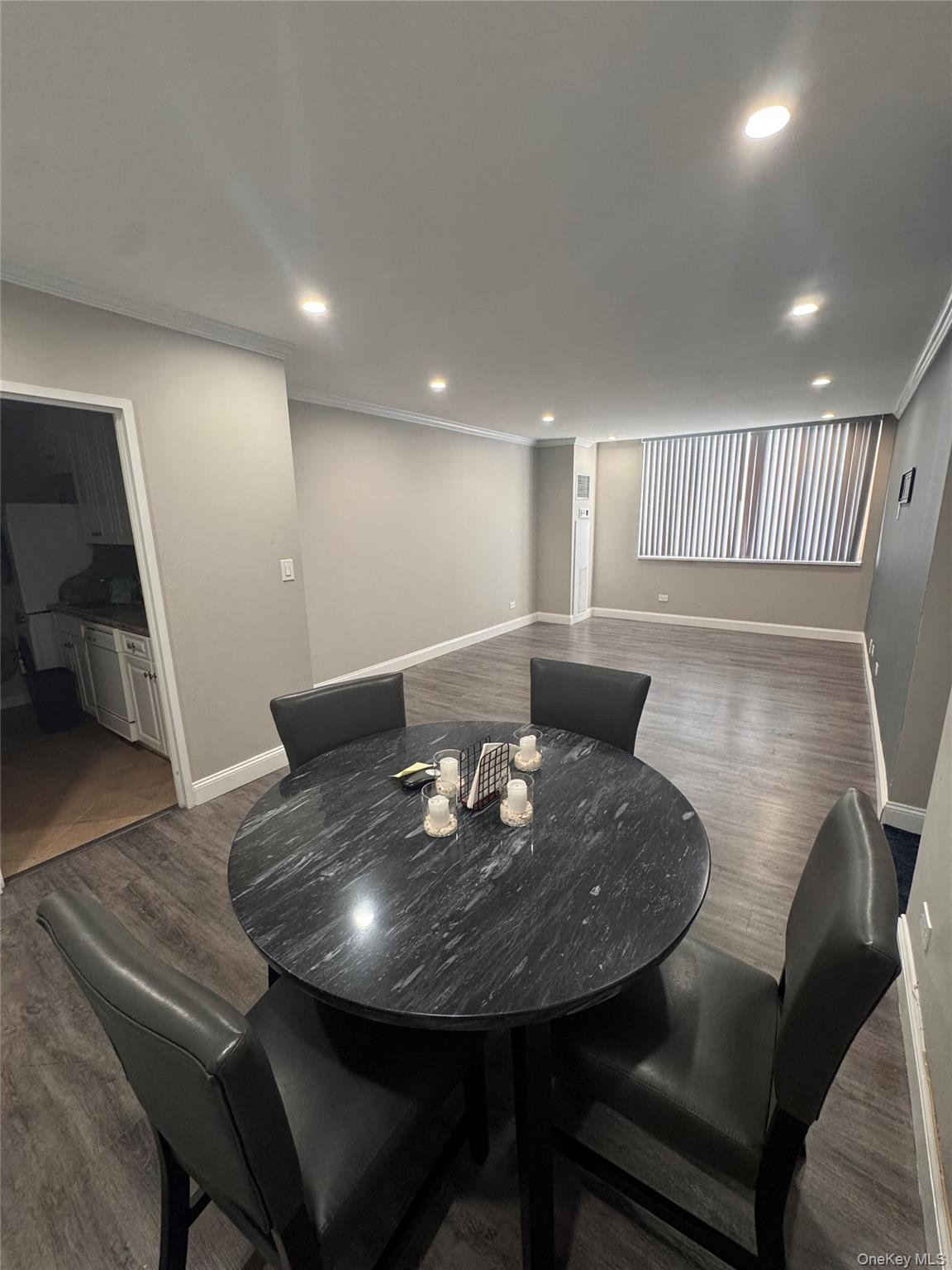 269 Grand Central Parkway, Unit 2C Queens, NY 11005 - Photo 4 of 18 Dining space with wood finished floors, crown molding, and recessed lighting