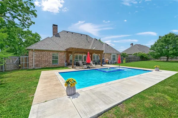 a view of outdoor space yard and swimming pool