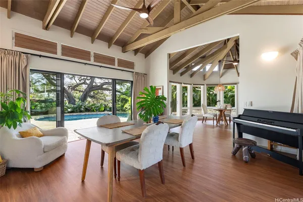 a outdoor space with furniture and wooden floor