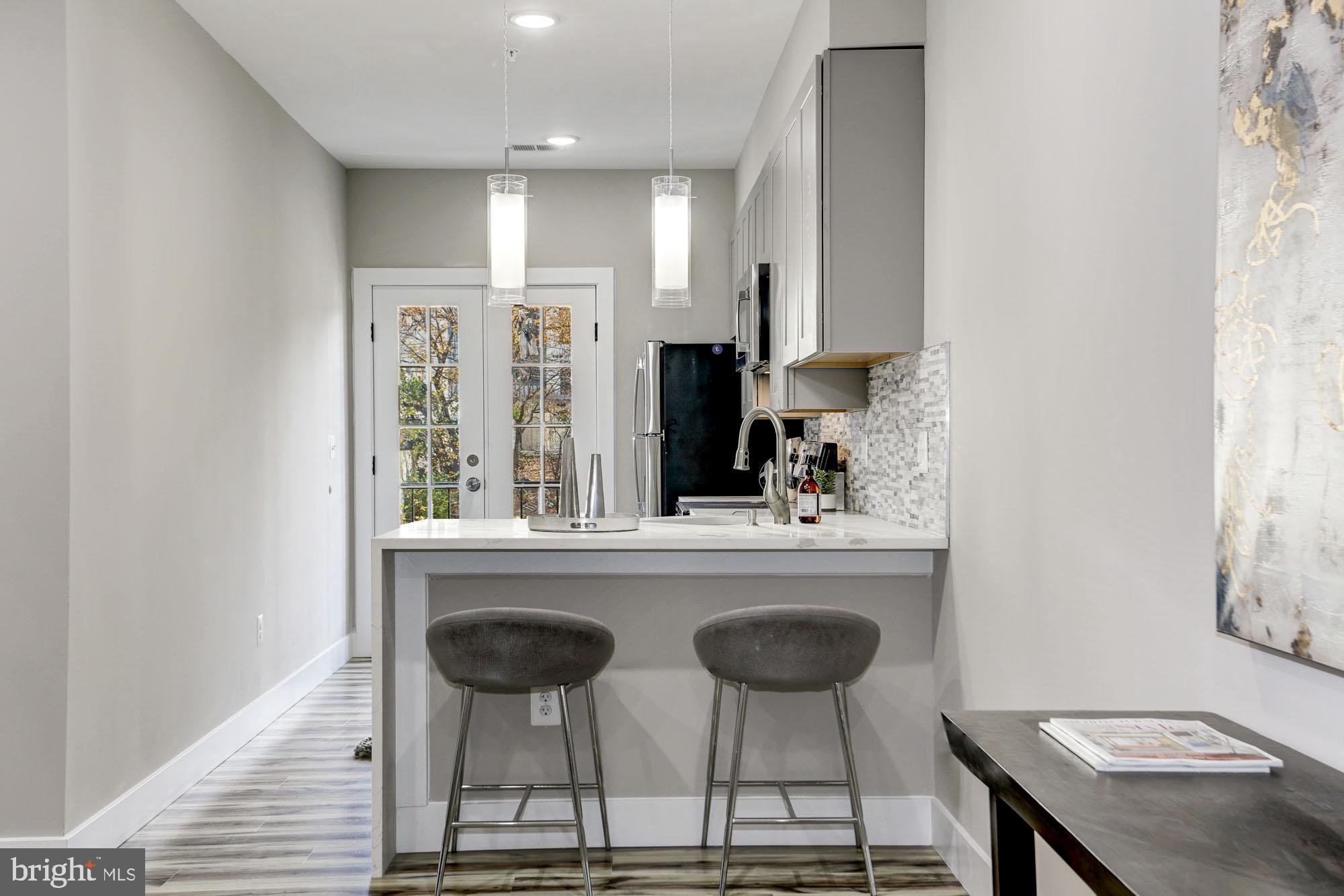 1040 Bladensburg Road Northeast, Unit 2A Washington, DC 20002 - Photo 2 of 11 Kitchen seating