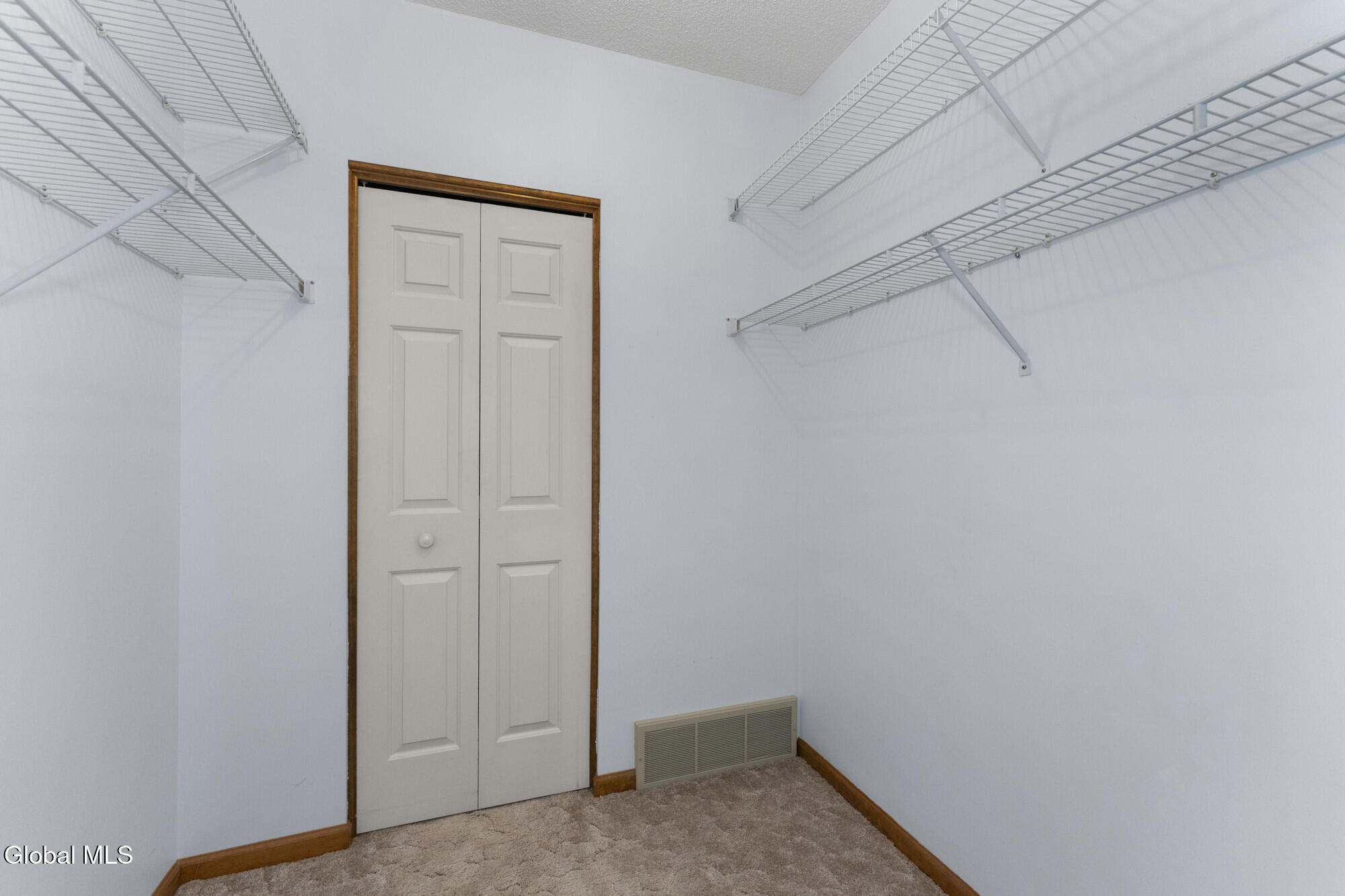 1976 Curry Road, Unit A102 Rotterdam, NY 12303 - Photo 15 of 23 Primary Walk in closit