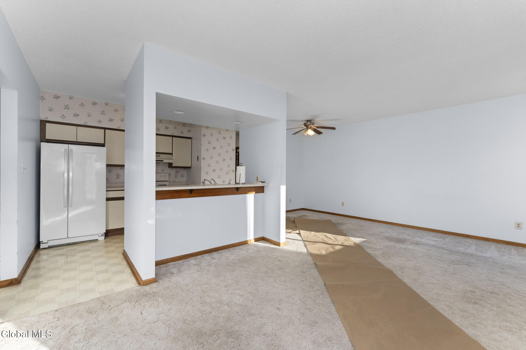 1976 Curry Road, Unit A102 Rotterdam, NY 12303 - Photo 3 of 23 Great room pass thru countertop