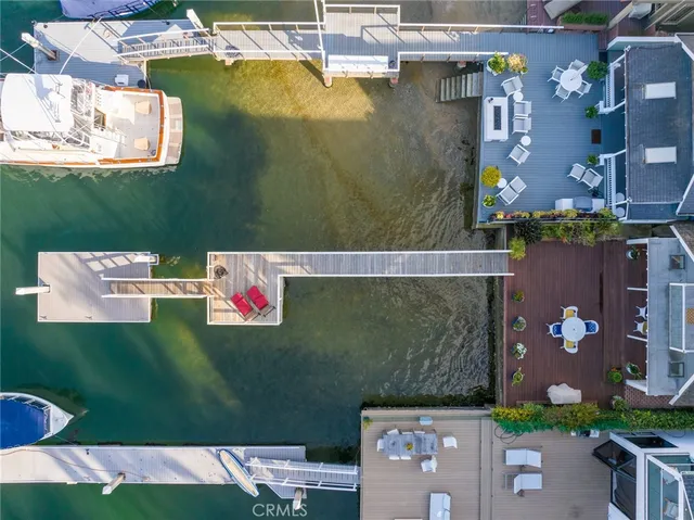 an aerial view of a house with a swimming pool