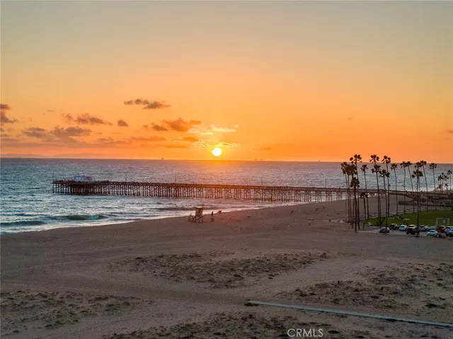 a kitchen with a white cabinets stove and sink
