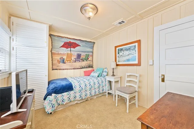 a bathroom with a sink a mirror and a shower