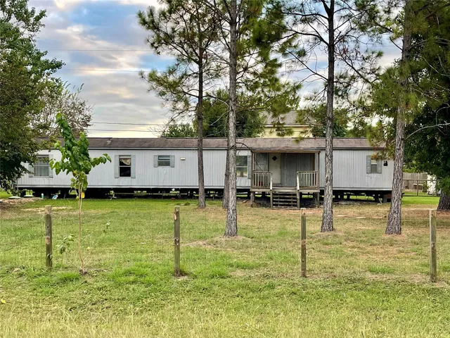 a view of a swimming pool with a garden