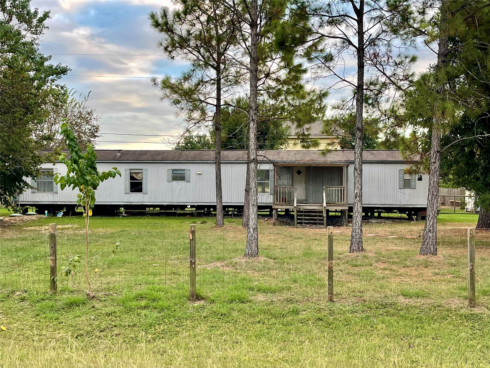 4730 Bayou Lane Rosharon, TX 77583 - Photo 3 of 13 a view of a swimming pool with a garden