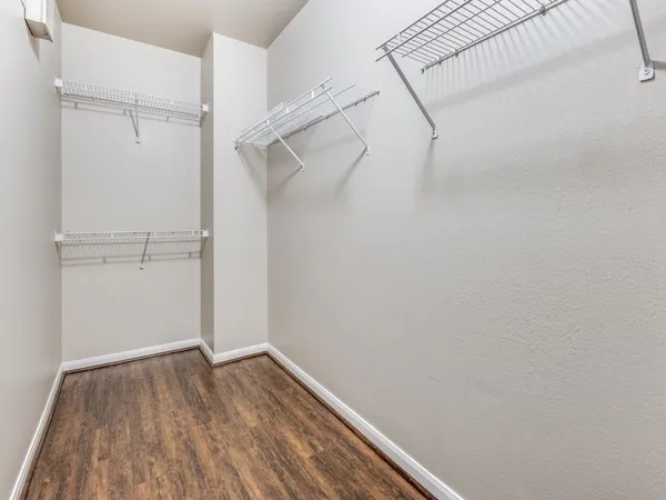 a view of an empty walk in closet