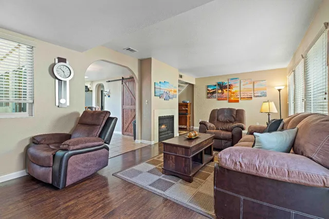 a living room with furniture or couch and a window