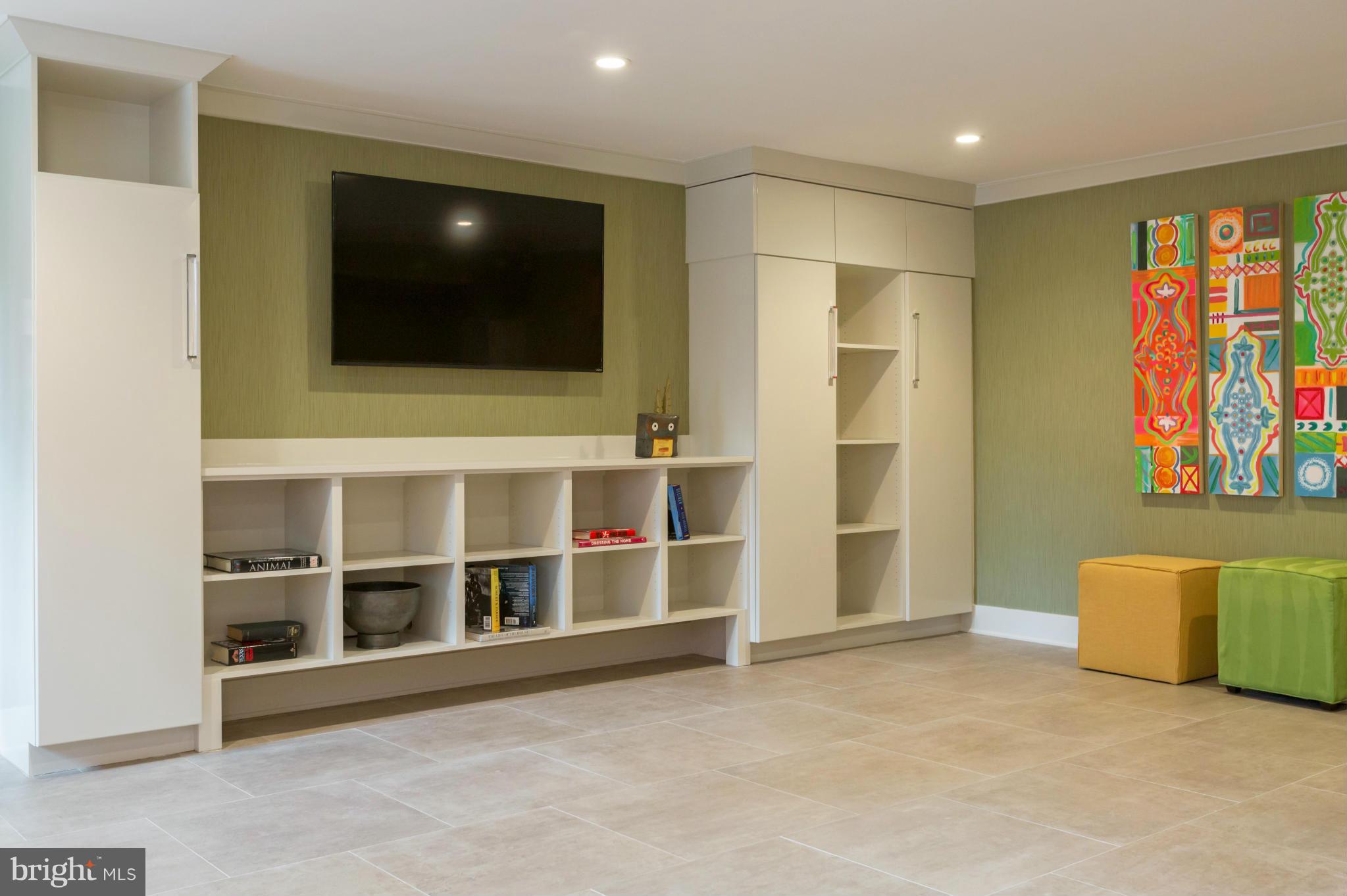 4871 Glenbrook Road Northwest Washington, DC 20016 - Photo 11 of 21 a view of an empty room with furniture and a window