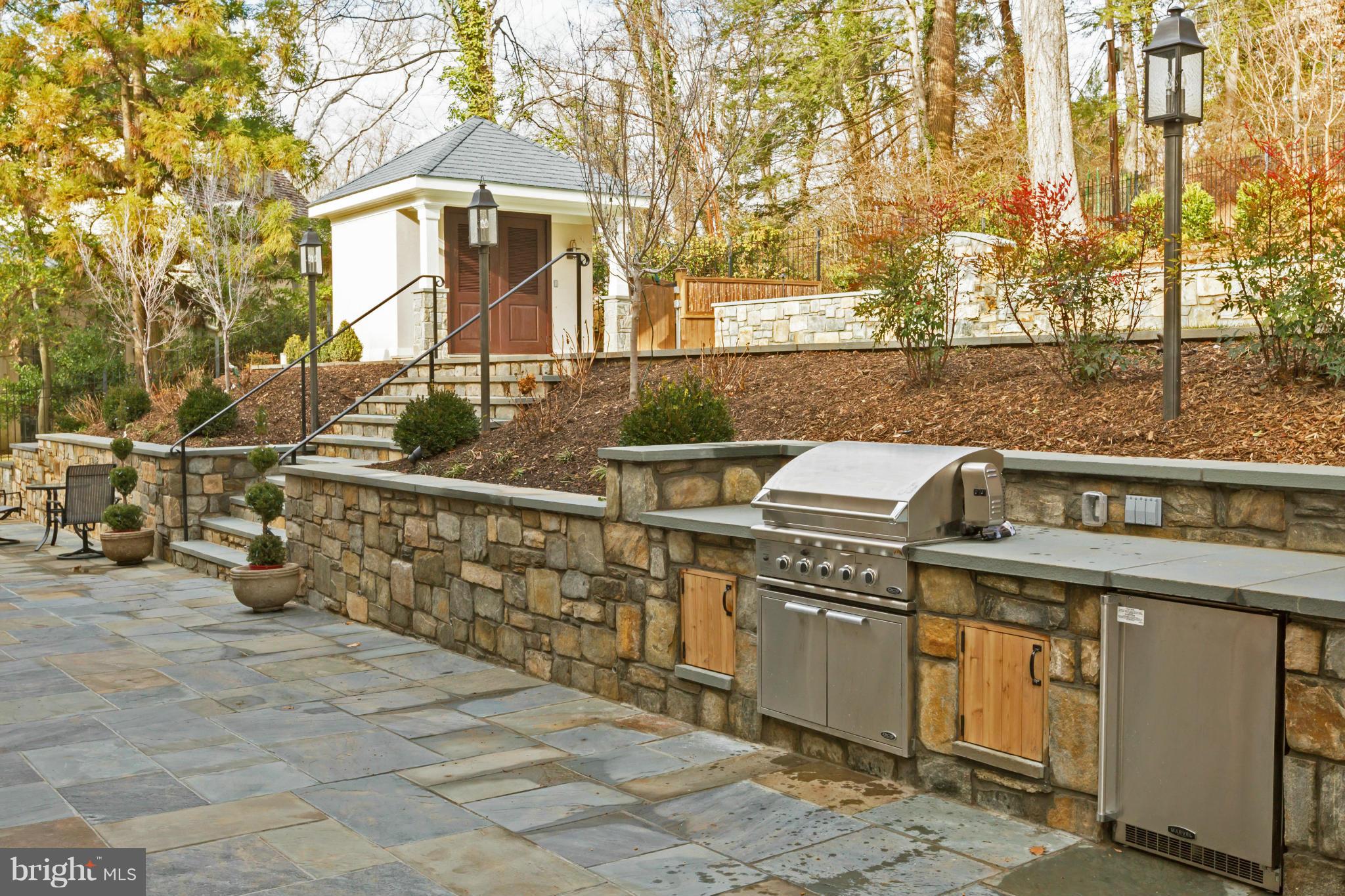 4871 Glenbrook Road Northwest Washington, DC 20016 - Photo 13 of 21 a view of a chairs and table on the terrace