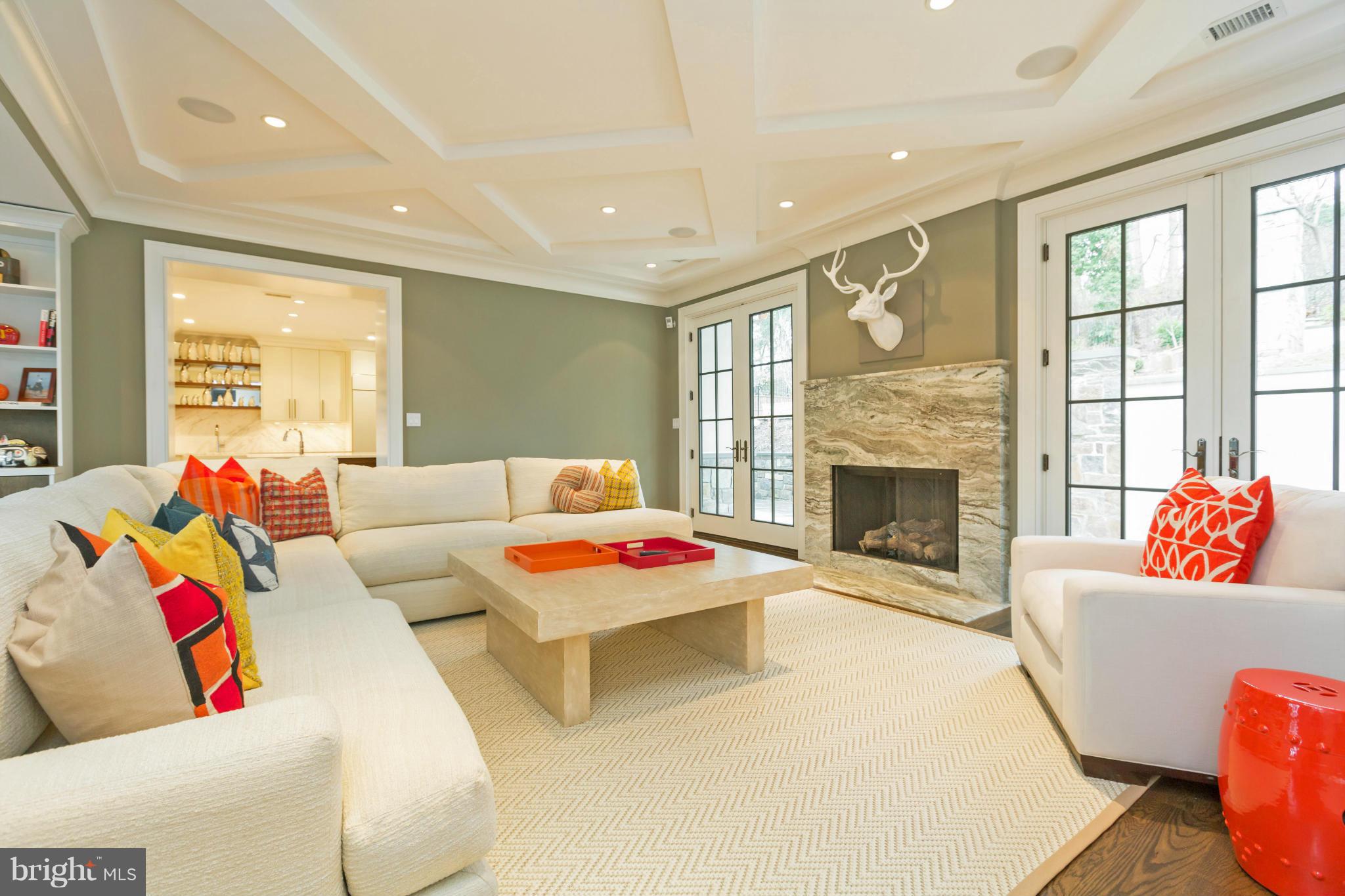 4871 Glenbrook Road Northwest Washington, DC 20016 - Photo 4 of 21 a living room with furniture and a fireplace