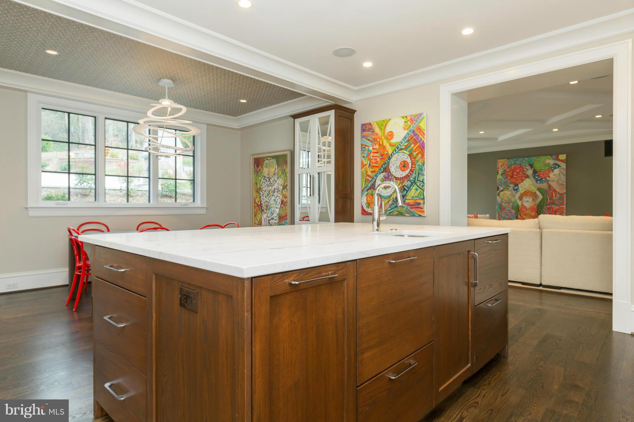 4871 Glenbrook Road Northwest Washington, DC 20016 - Photo 6 of 21 a view of a kitchen with stainless steel appliances granite countertop a sink and a large window