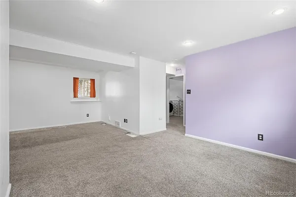 a view of room with air conditioner and stairs