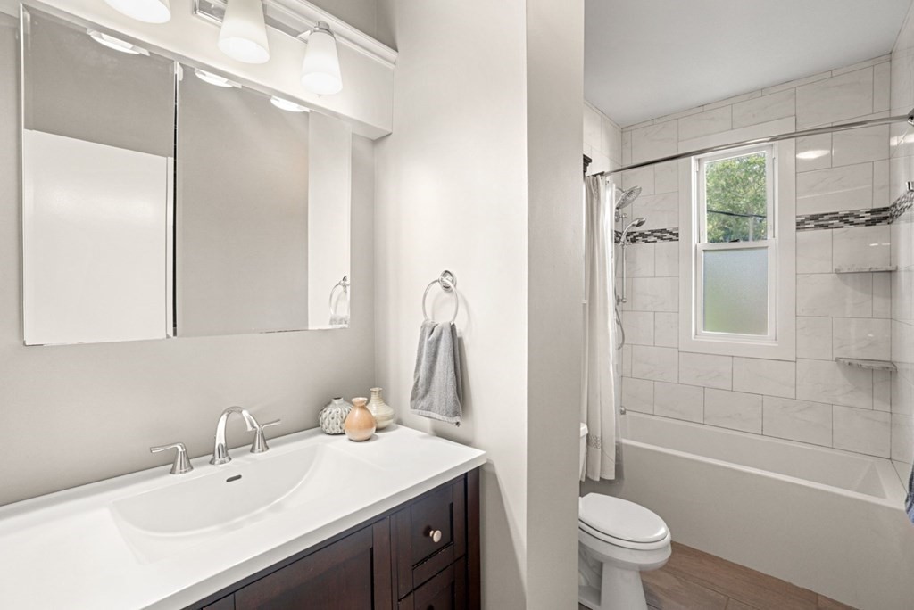 90 Robbins Road, Unit 2 Arlington, MA 02476 - Photo 20 of 32 a bathroom with a sink toilet tub and shower