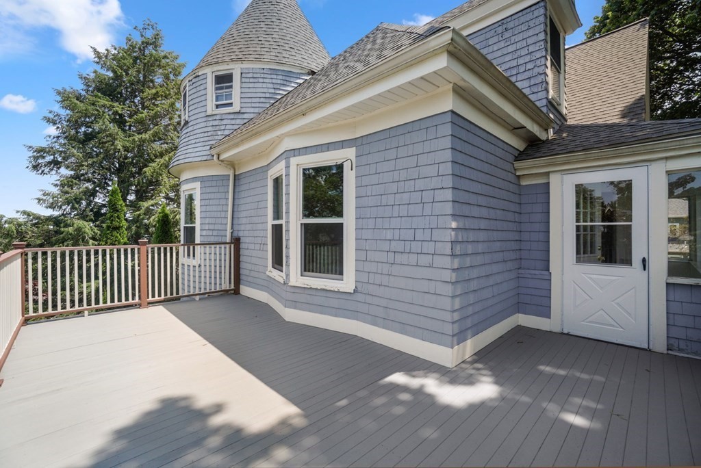 90 Robbins Road, Unit 2 Arlington, MA 02476 - Photo 22 of 32 a view of a house with a porch