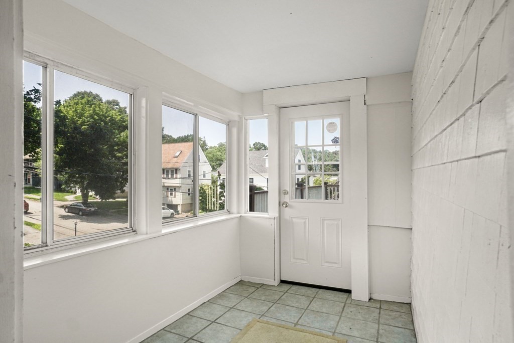 90 Robbins Road, Unit 2 Arlington, MA 02476 - Photo 25 of 32 a view of a room that has a large window