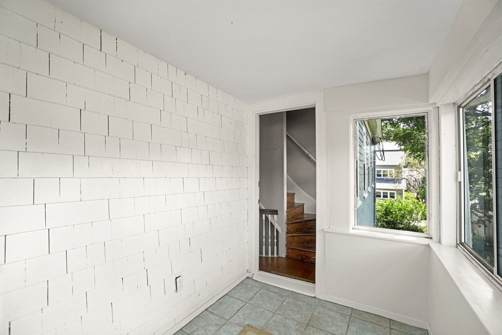 90 Robbins Road, Unit 2 Arlington, MA 02476 - Photo 26 of 32 an empty room with windows