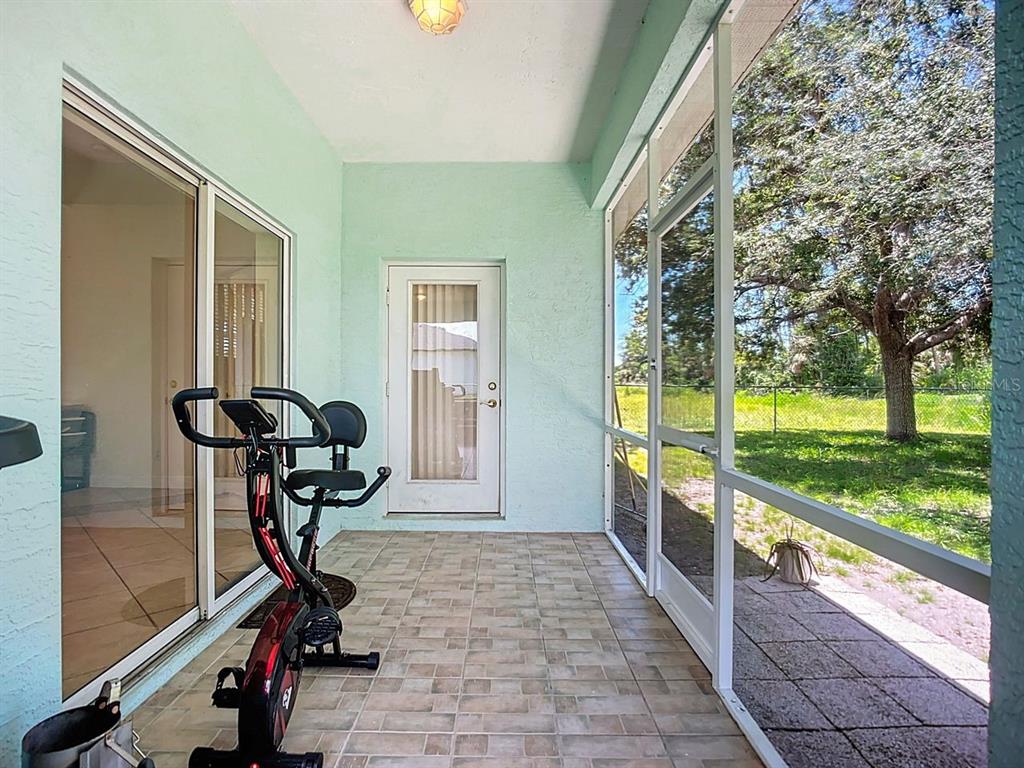 394 Sunset Road Rotonda West, FL 33947 - Photo 34 of 41 a view of a room with gym equipment