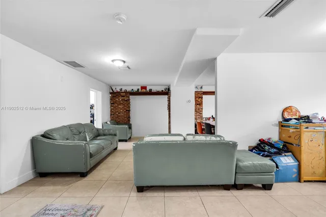 a living room with furniture and a couch