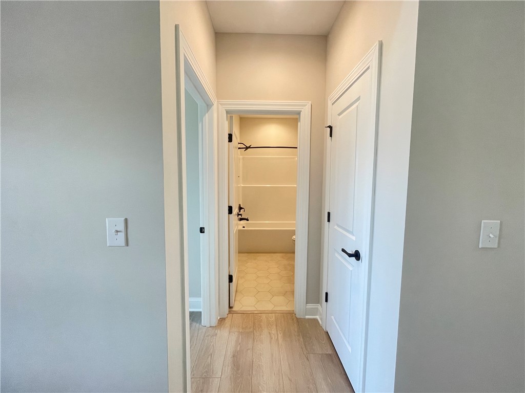 109 Sunrise Court, Unit SUN0005 Anderson, SC 29625 - Photo 21 of 37 Downstairs Hall/Entry to Bedroom 4/Bath 3