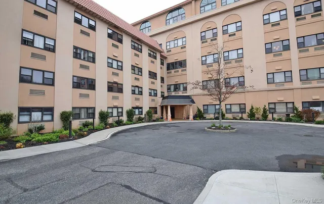 a view of a building with a street